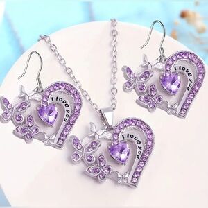 Beautiful three-piece, silver tone and purple heart necklace set